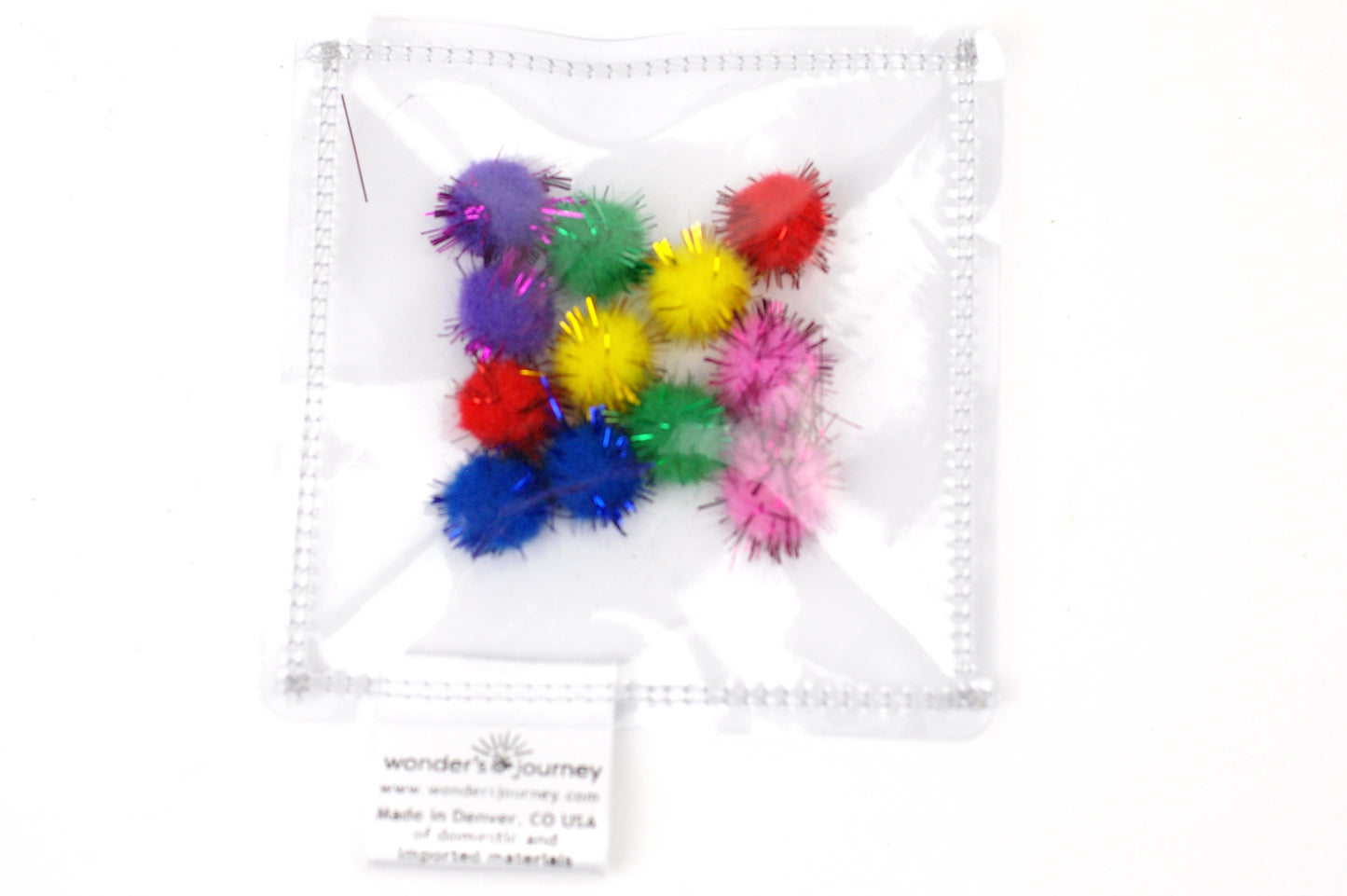 Clear sensory pouch with pom poms - Wonder's Journey