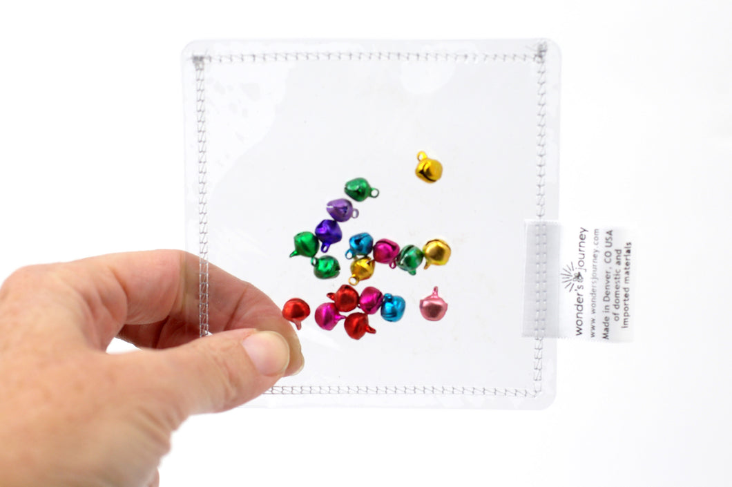 Clear sensory pouch with bells - Wonder's Journey