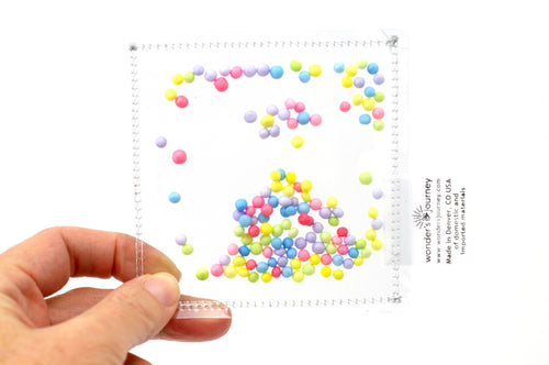 Clear sensory pouch with styrofoam beads - Wonder's Journey