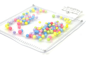 Clear sensory pouch with styrofoam beads - Wonder's Journey