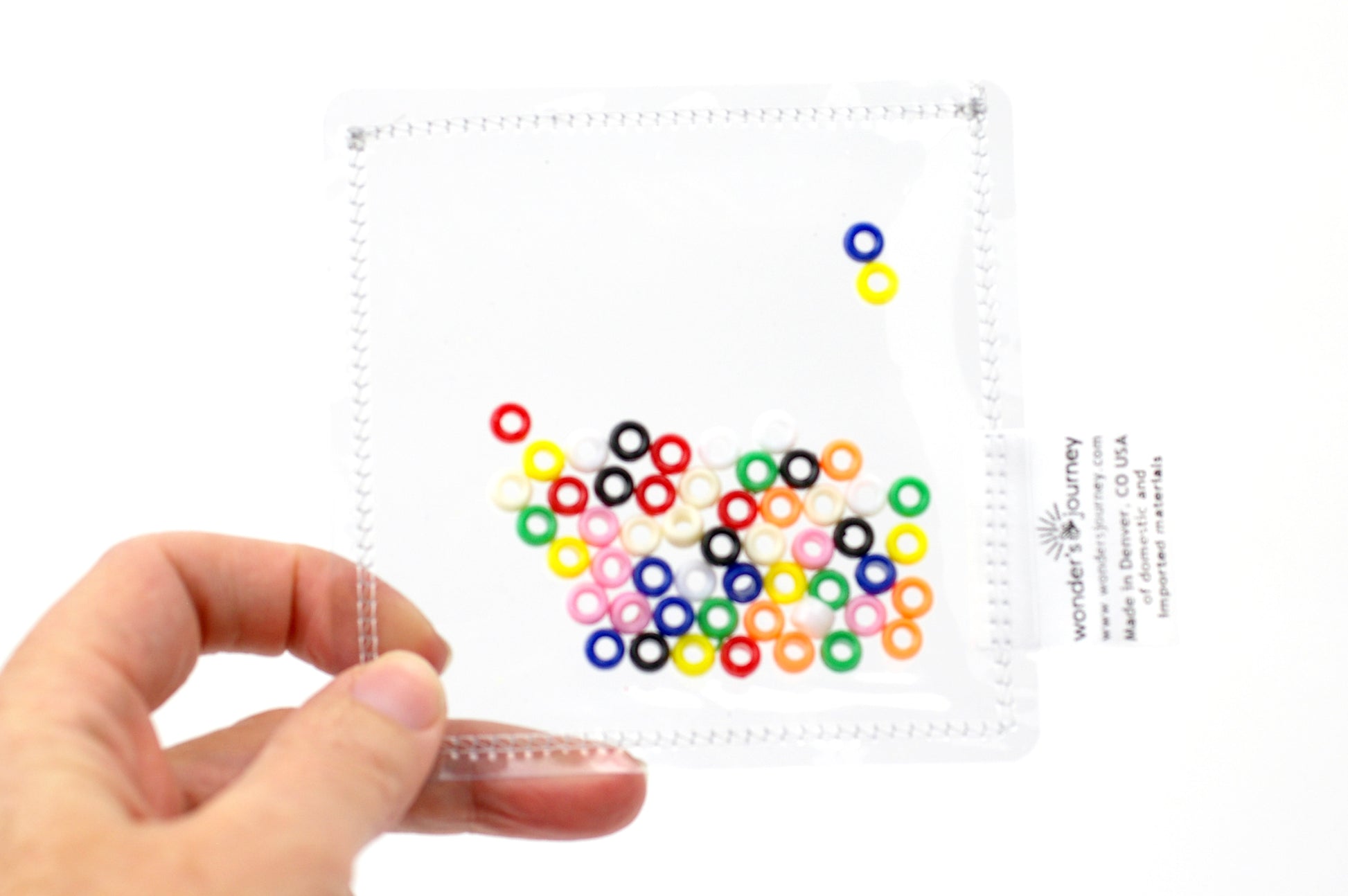 Clear sensory pouch with mini pony beads - Wonder's Journey