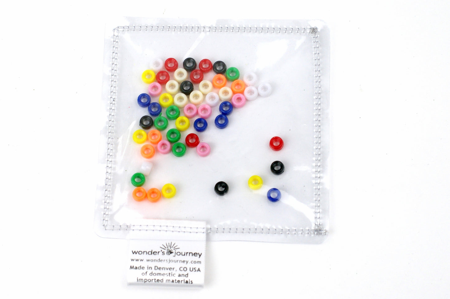 Clear sensory pouch with mini pony beads - Wonder's Journey