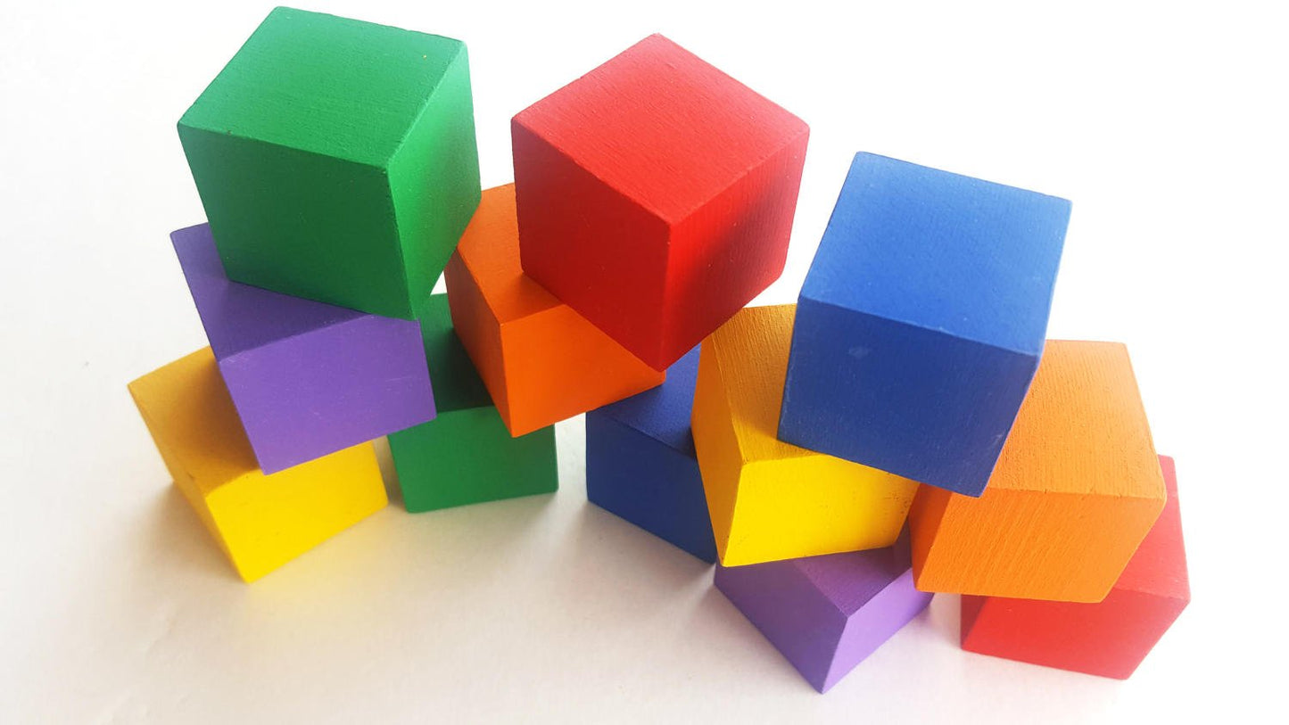 Toddler stacking blocks - Wonder's Journey