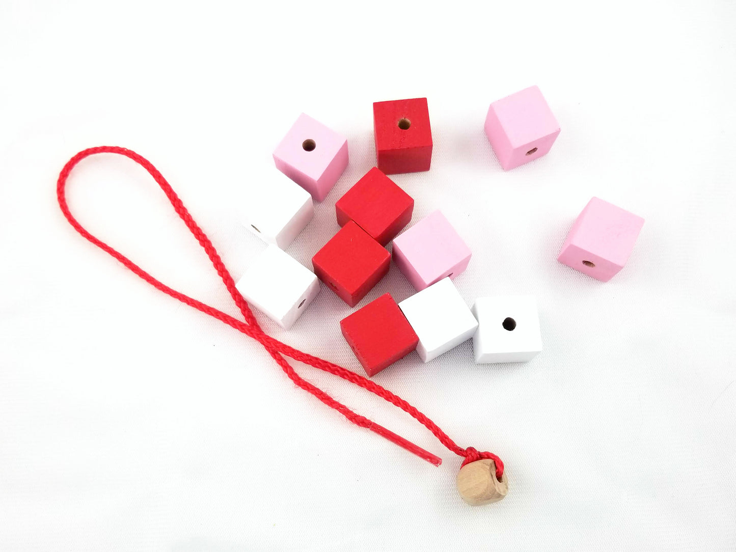 Valentine's Day preschool lacing beads - Wonder's Journey