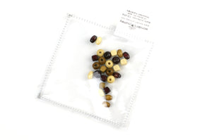 Clear sensory pouch with wooden beads - Wonder's Journey
